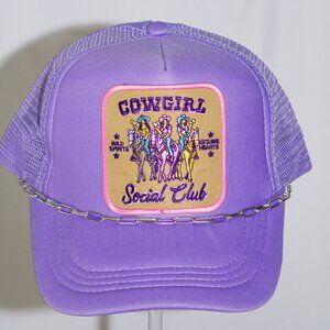 Purple "Cowgirl Social Club" trucker hat with hat jewelry